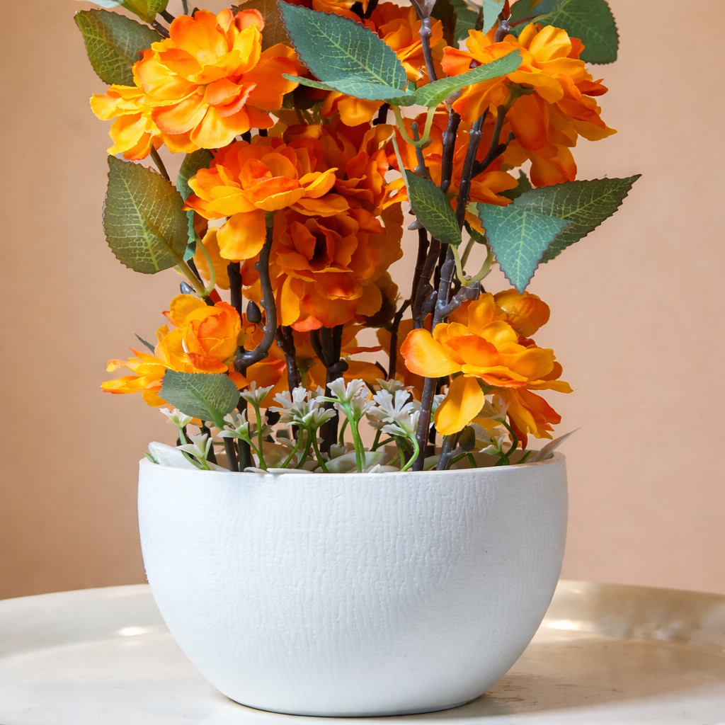 White Flower Waise Along With Plastic Leaves And Orange Flowers