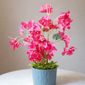 White Flower Waise Along With Plastic Leaves And Pink Flowers