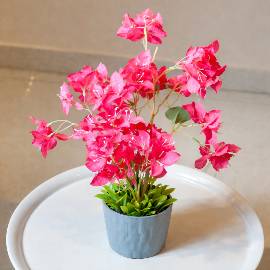 White Flower Waise Along With Plastic Leaves And Pink Flowers