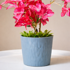 White Flower Waise Along With Plastic Leaves And Pink Flowers